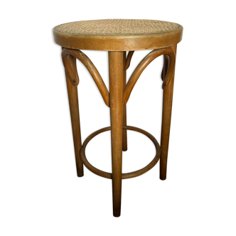 Curved wooden stool and cannage
