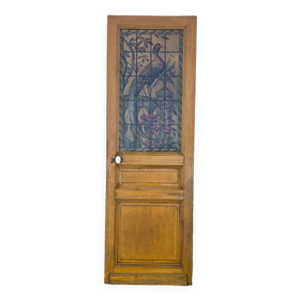 ancienne porte avec vitre décorée