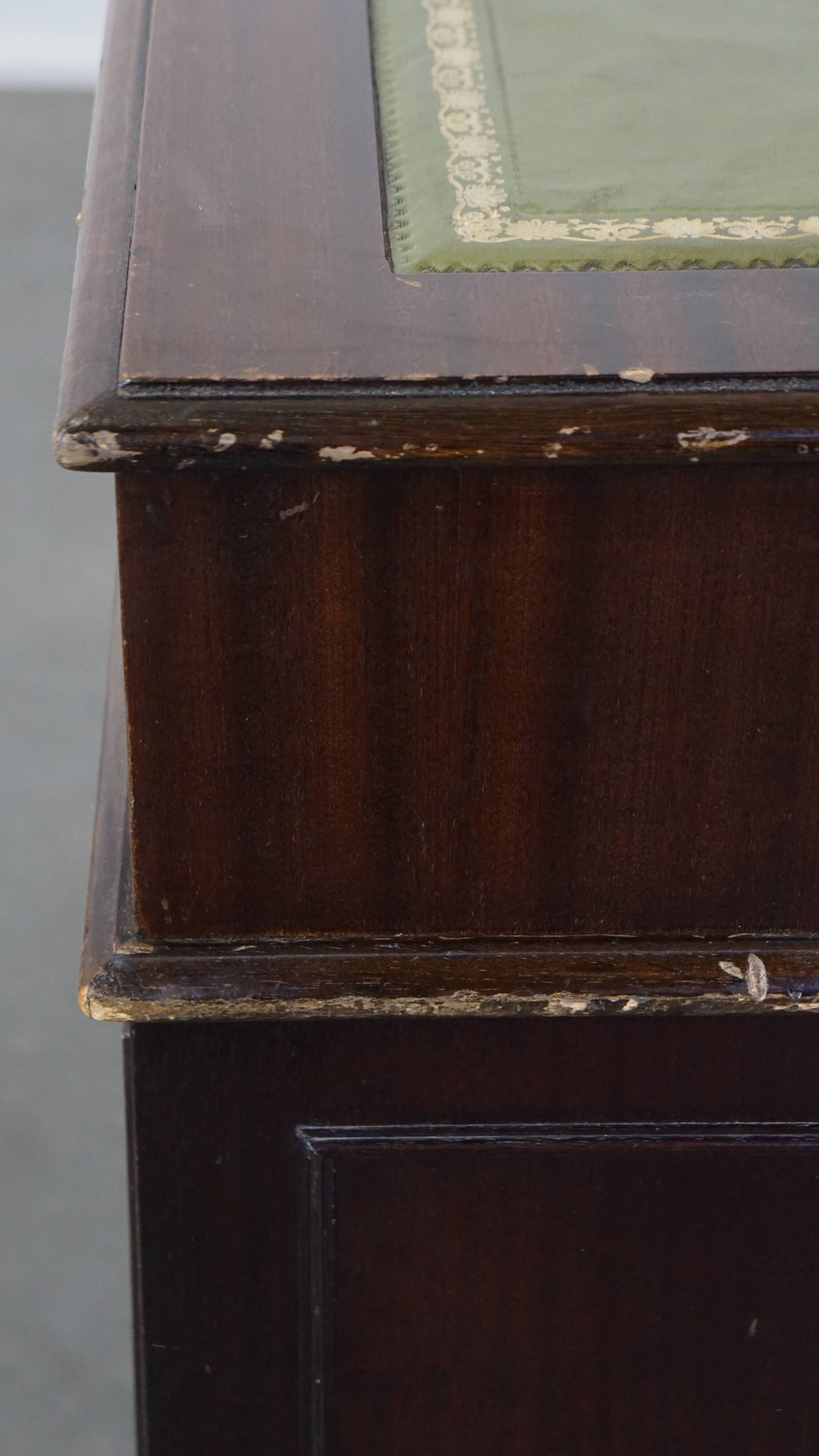 English style chesterfield desk with patina and a green leather top
