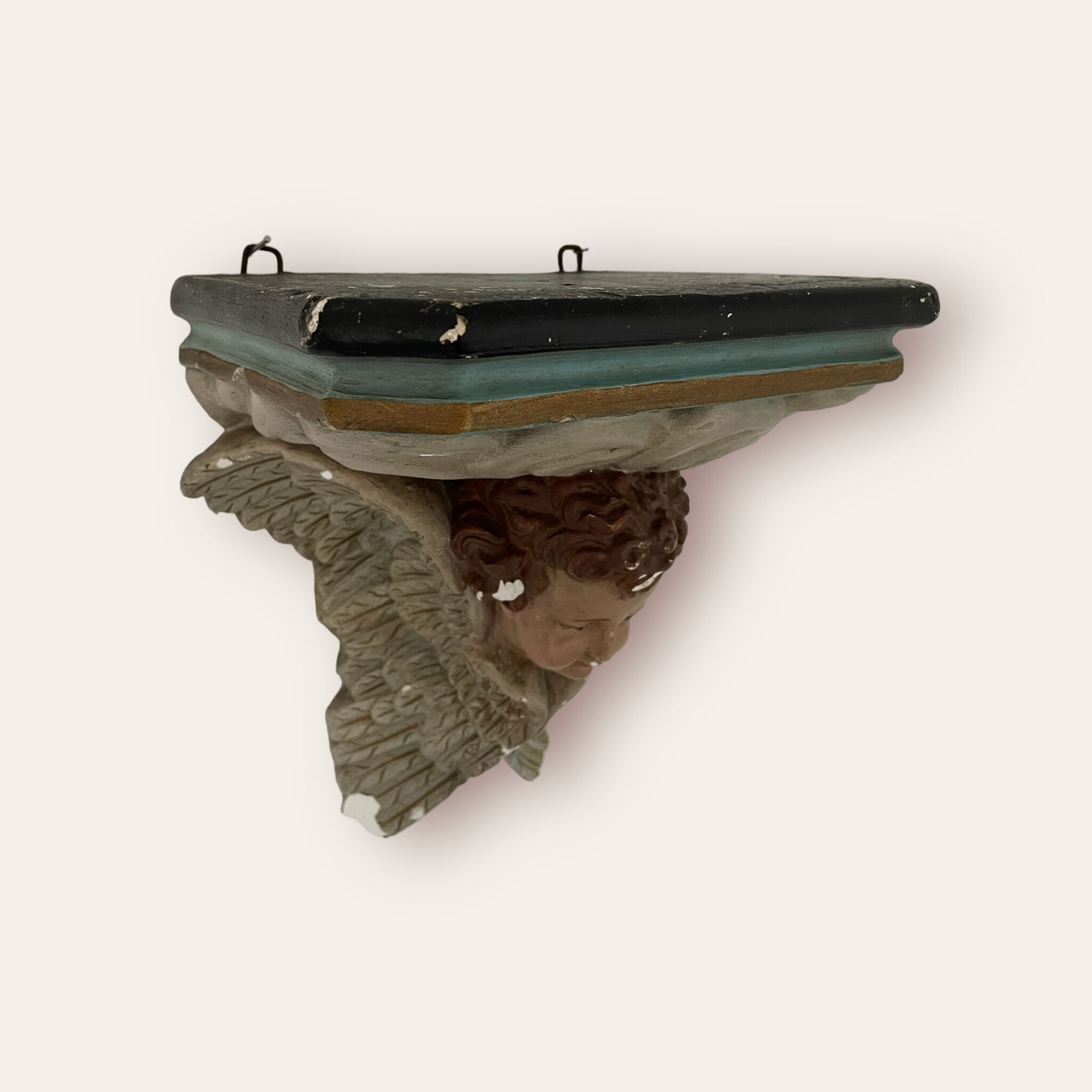 Nineteenth century plaster wall console, cherub decoration