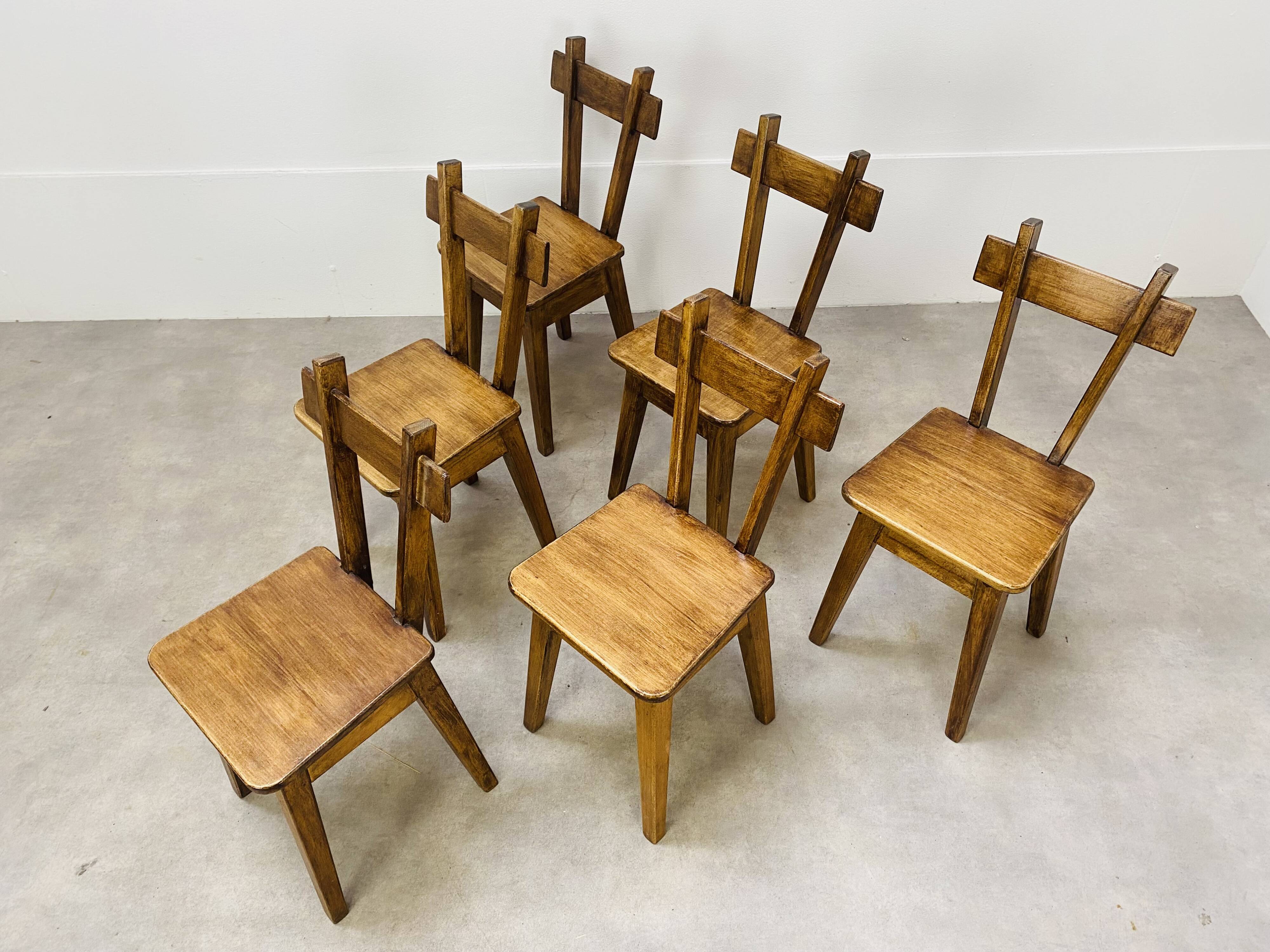 6 brutalist solid wood chairs