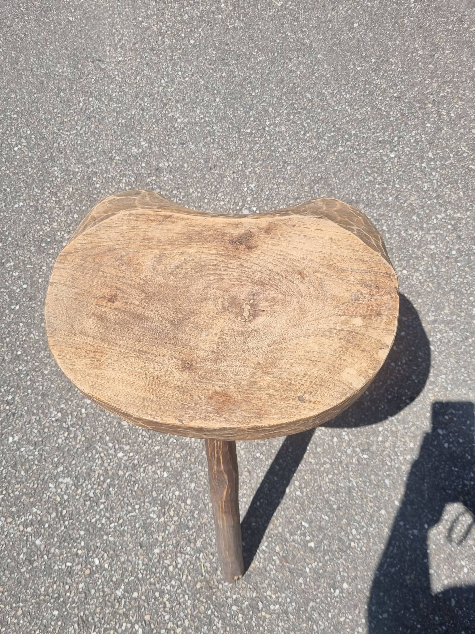 Old wooden tripod stool