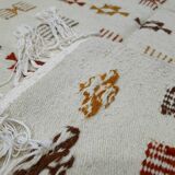 Handmade Berber patterned rug in natural wool