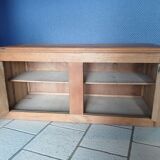 Low oak furniture in the Dudouyt style, with a sculpted front.