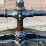 Old printing press in very old cast iron