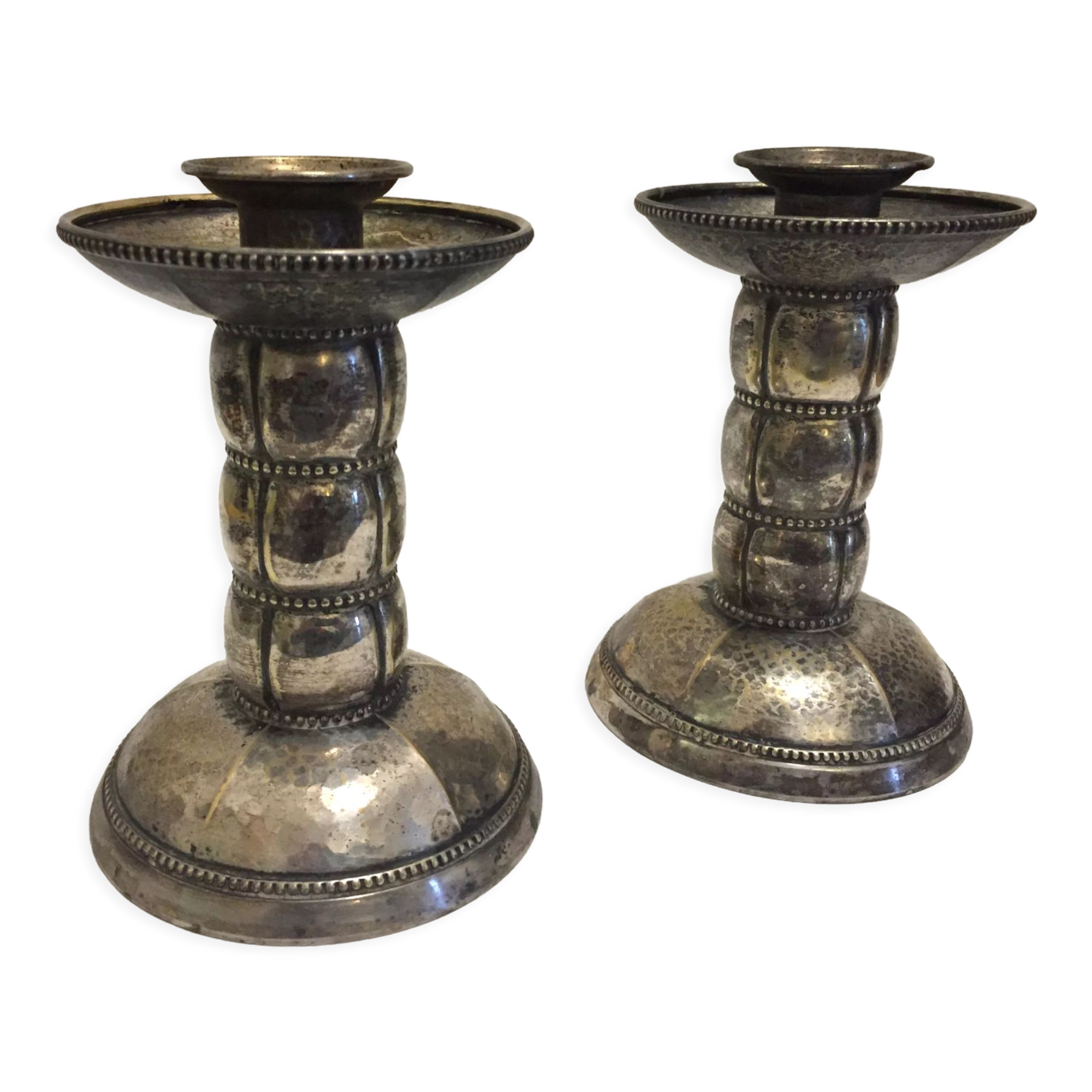 Pair of silver metal candle holders