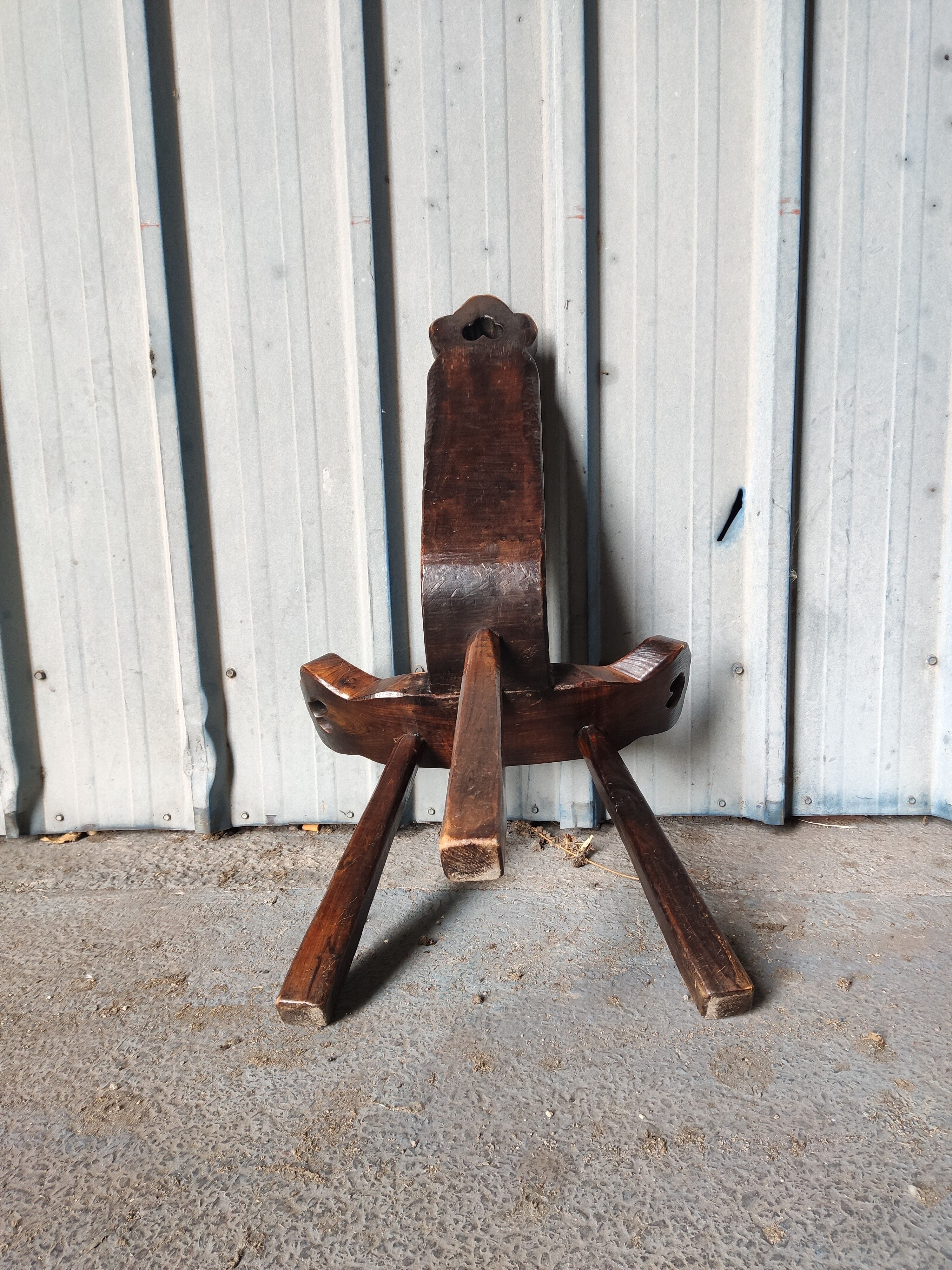 Brutalist tripod chair in solid wood
