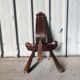 Brutalist tripod chair in solid wood