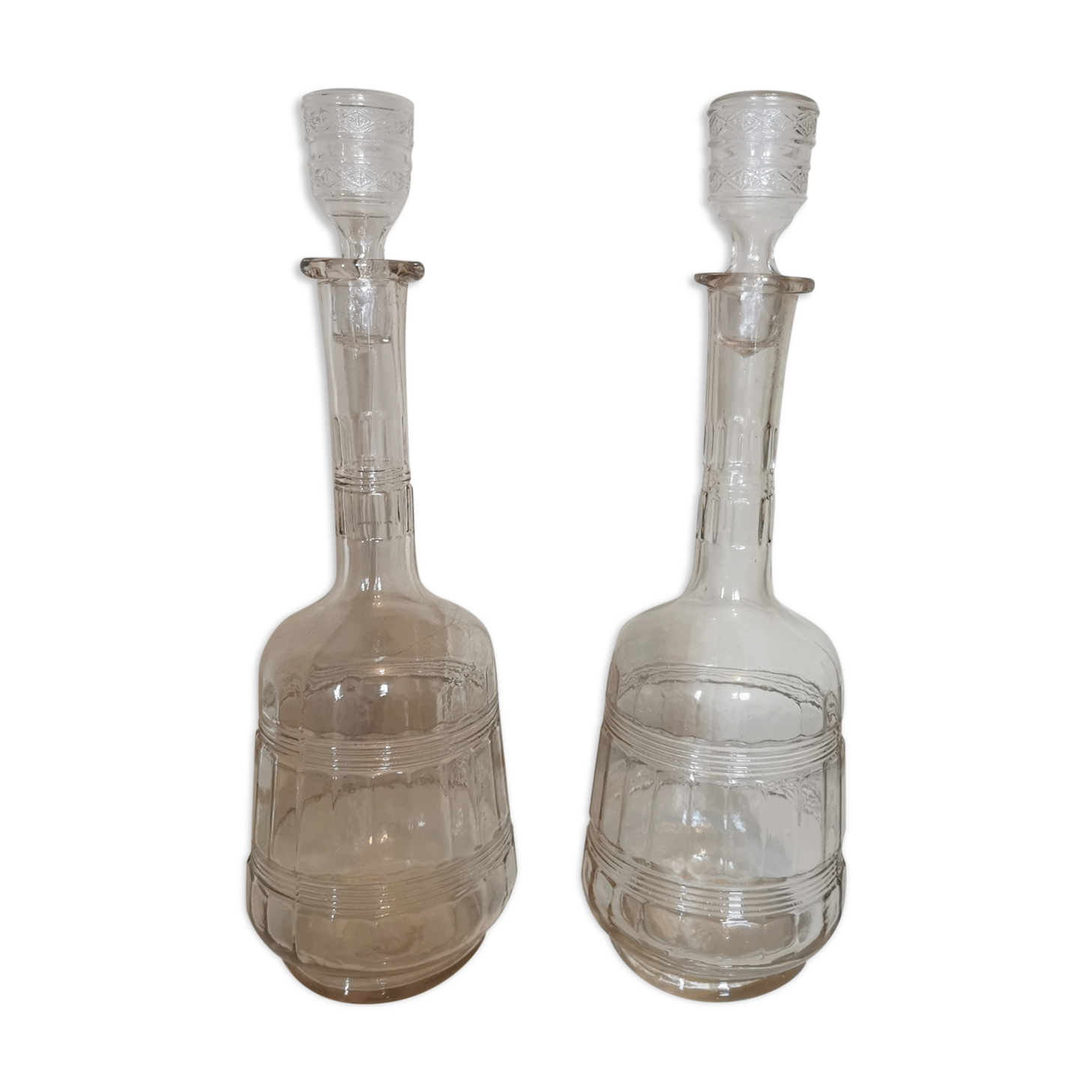 Pair of antique moulded glass decanters