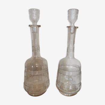 Pair of antique moulded glass decanters