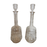 Pair of antique moulded glass decanters