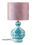 Royal Delft blue-green ceramic table lamp with pink jacquard peacock shade.