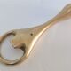 Modernist solid brass bottle opener by Carl Auböck