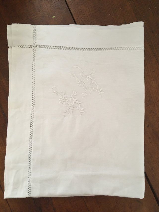 Old pillow taie in L B monogrammed cotton.