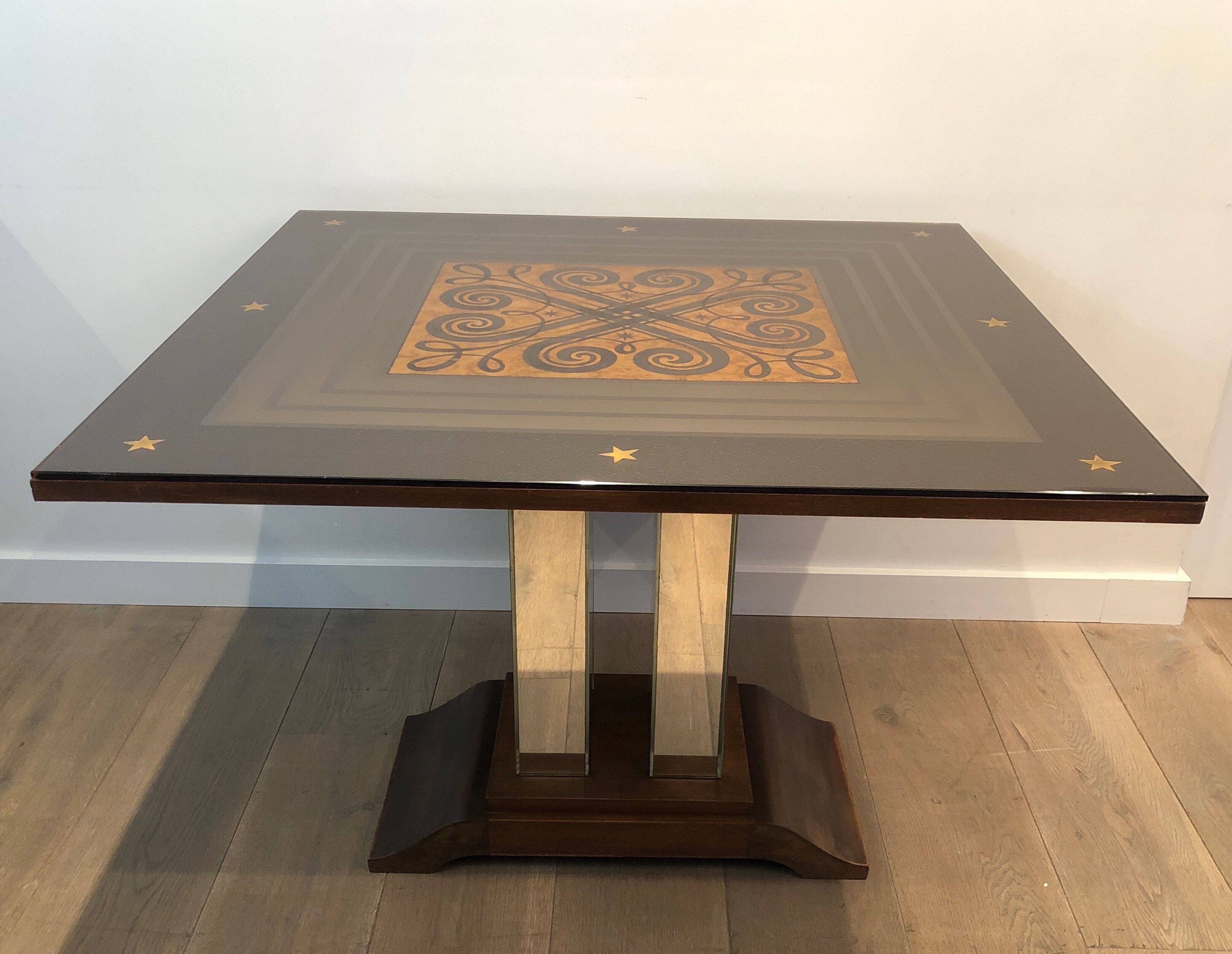 Art Deco centre table with a mirrored eglomisé top in the style of Jules Leleu and Max Ingrand.