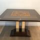 Art Deco centre table with a mirrored eglomisé top in the style of Jules Leleu and Max Ingrand.