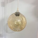 Vintage globe pendant in amber bubble glass