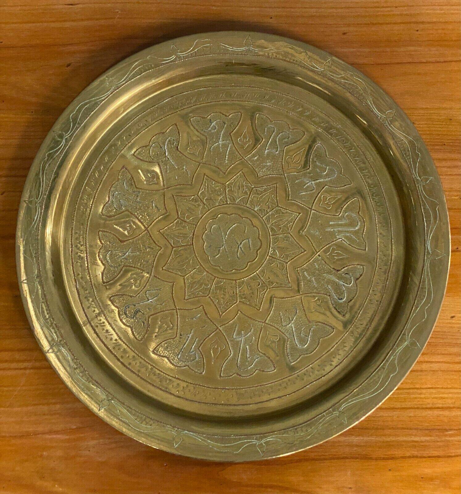 Oriental tea tray in copper or brass richly decorated 20th century