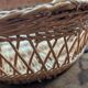 Vintage 1970s woven wicker basket with handle