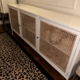 White wooden sideboard and canning