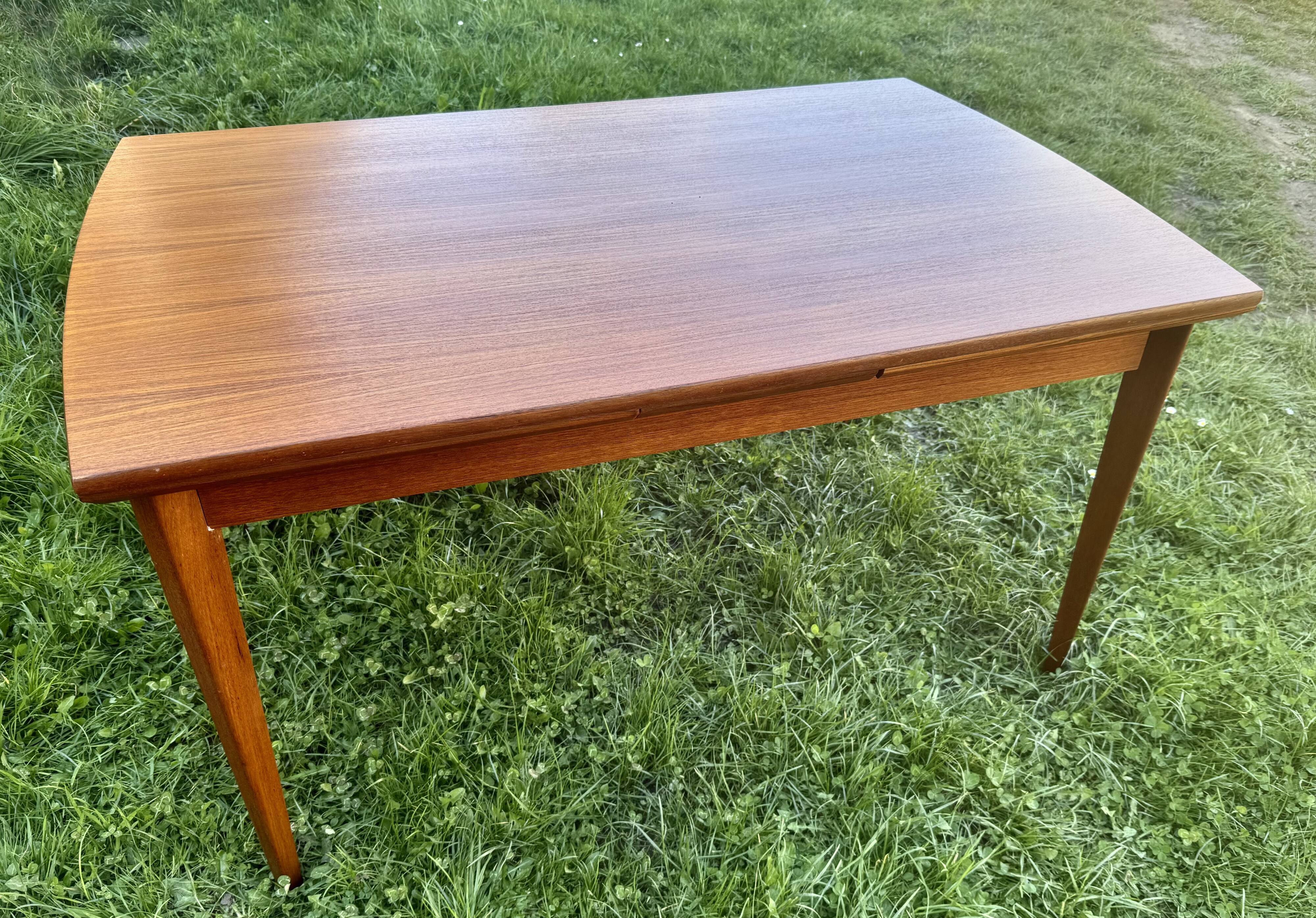 Scandinavian extendable teak dining table