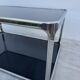 Chrome and smoked glass coffee table from the 1970s.