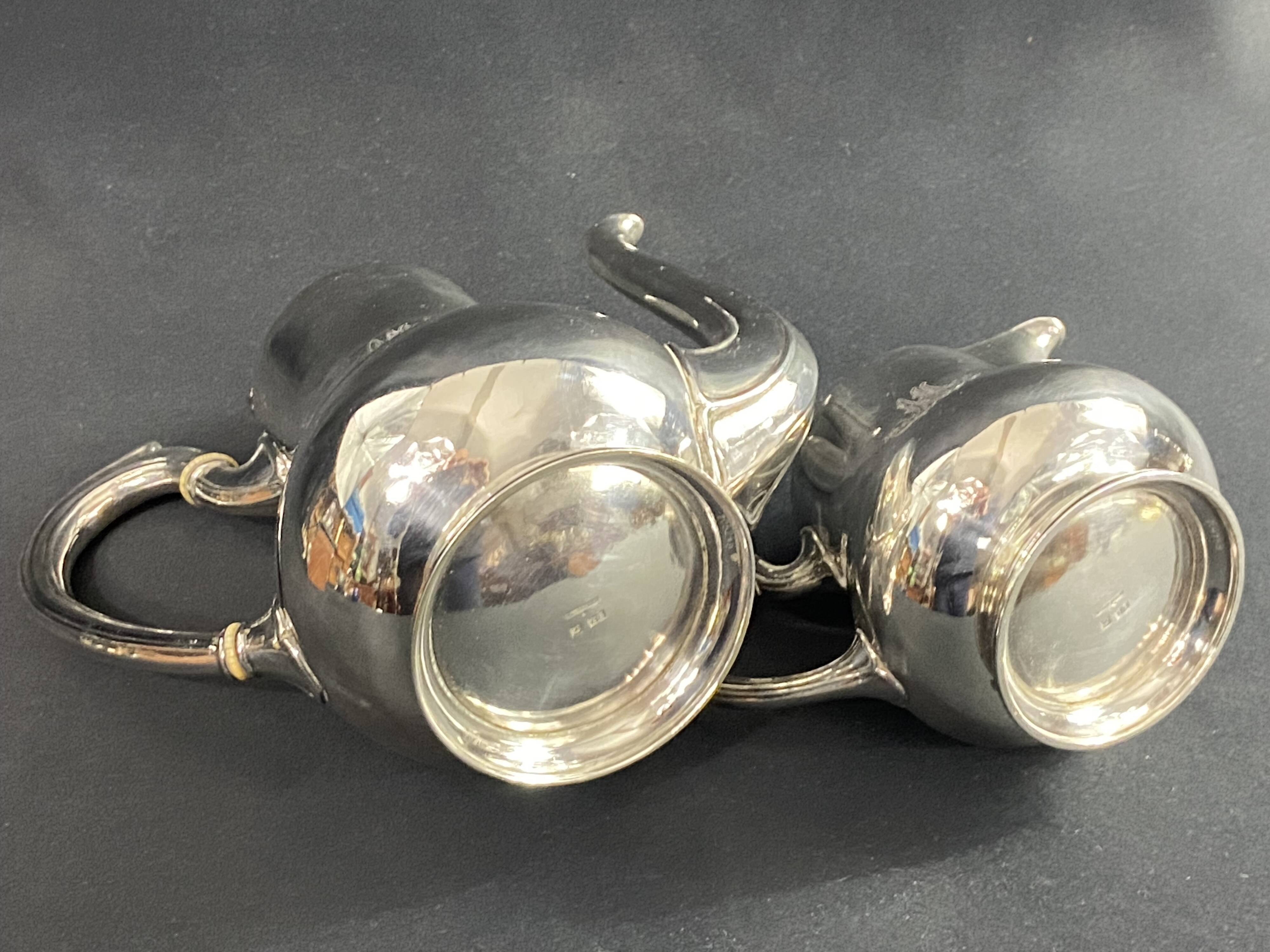 Silver-plated coffee pot and milk jug monogrammed MA, signed CHRISTOFLE.