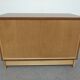 Low chest of drawers with 3 drawers in mahogany and white satin, France circa 1980.