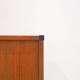 Enfilade en bois avec portes noires par George Coslin