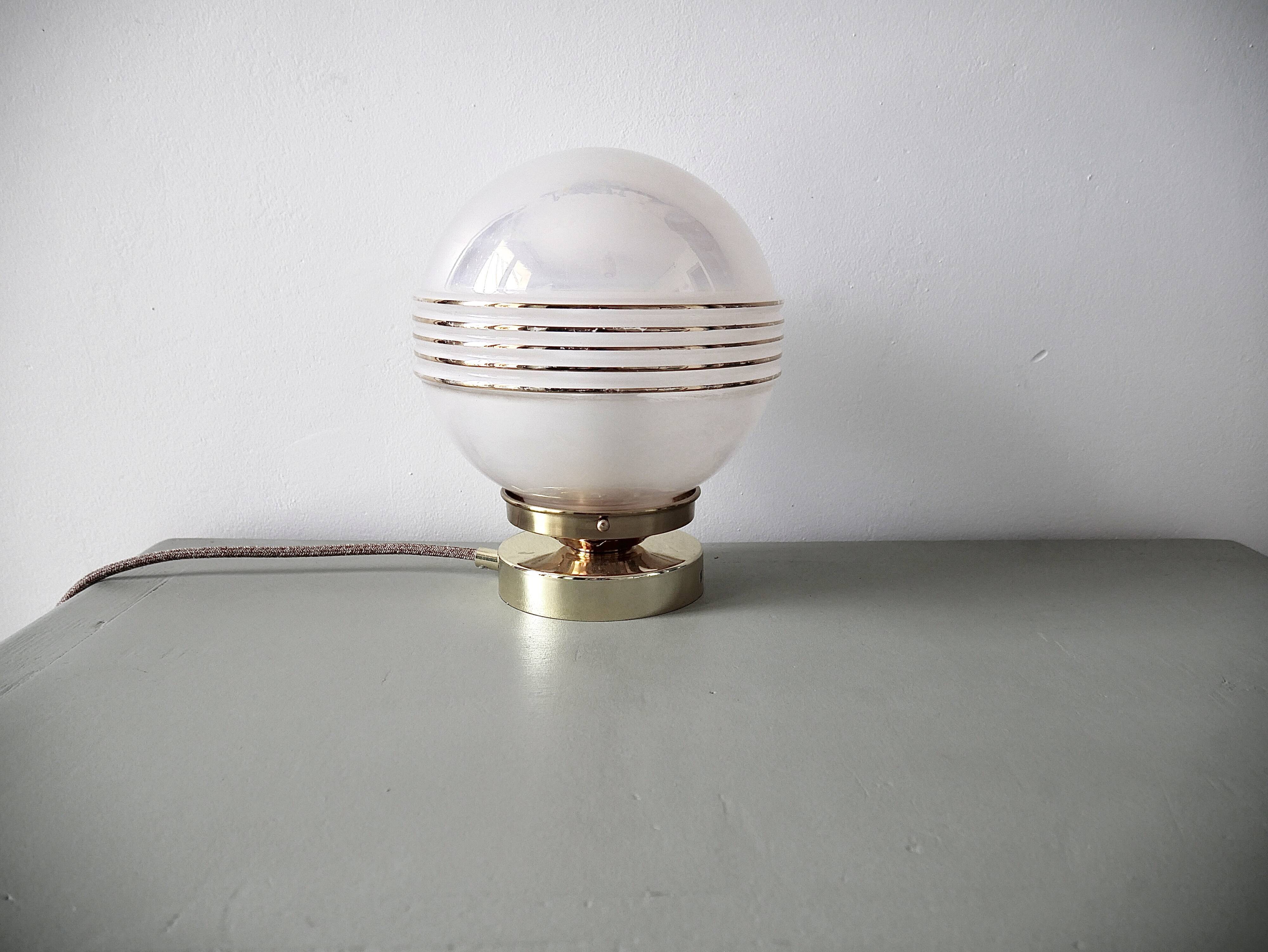 Pink iridescent glass lay lamp