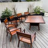 Rectangular dining table set and its suite of 6 armchairs in exotic wood and bamboo.