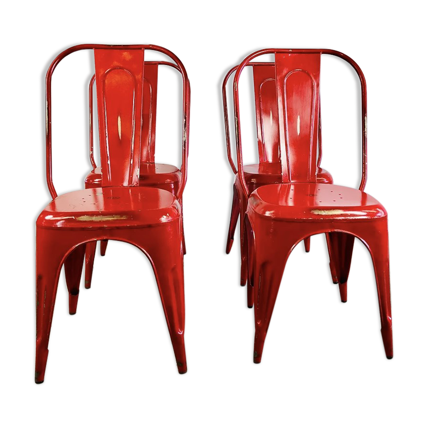 Set of four low chairs in red steel