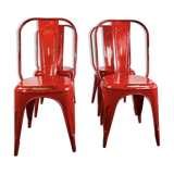 Set of four low chairs in red steel