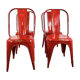 Ensemble de quatre chaises basses en acier rouge