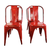 Ensemble de quatre chaises basses en acier rouge