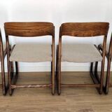 Set of 4 vintage Baumann "Sled" chairs in bent wood.