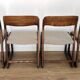 Set of 4 vintage Baumann "Sled" chairs in bent wood.