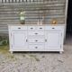 Buffet en bois patiné blanc