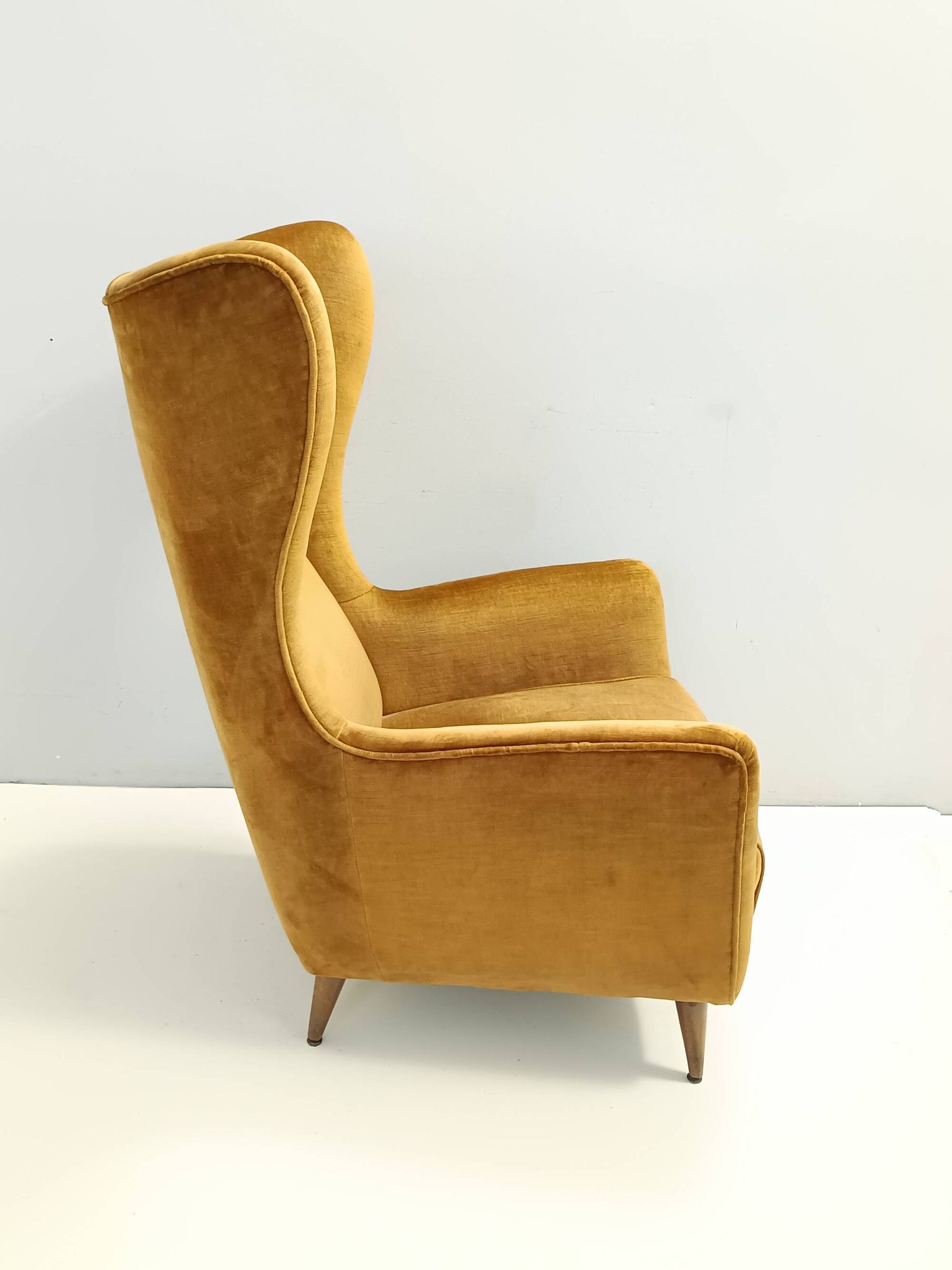 Dark Goldenrod Wingback Armchair model 437 by Gio Ponti for Cassina
