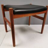 Danish designed footstool in teak wood and black skai “imitation leather”