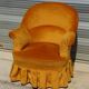 Fauteuil crapaud en velours jaune