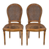 Paire de chaises à cannage de style Louis XVI