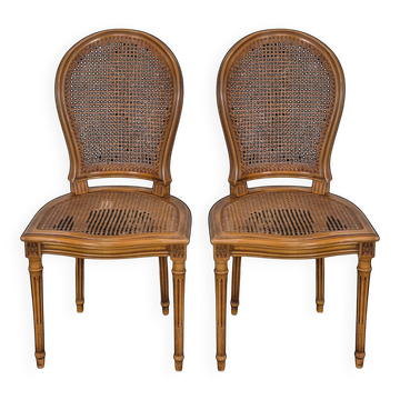 Paire de chaises à cannage de style Louis XVI