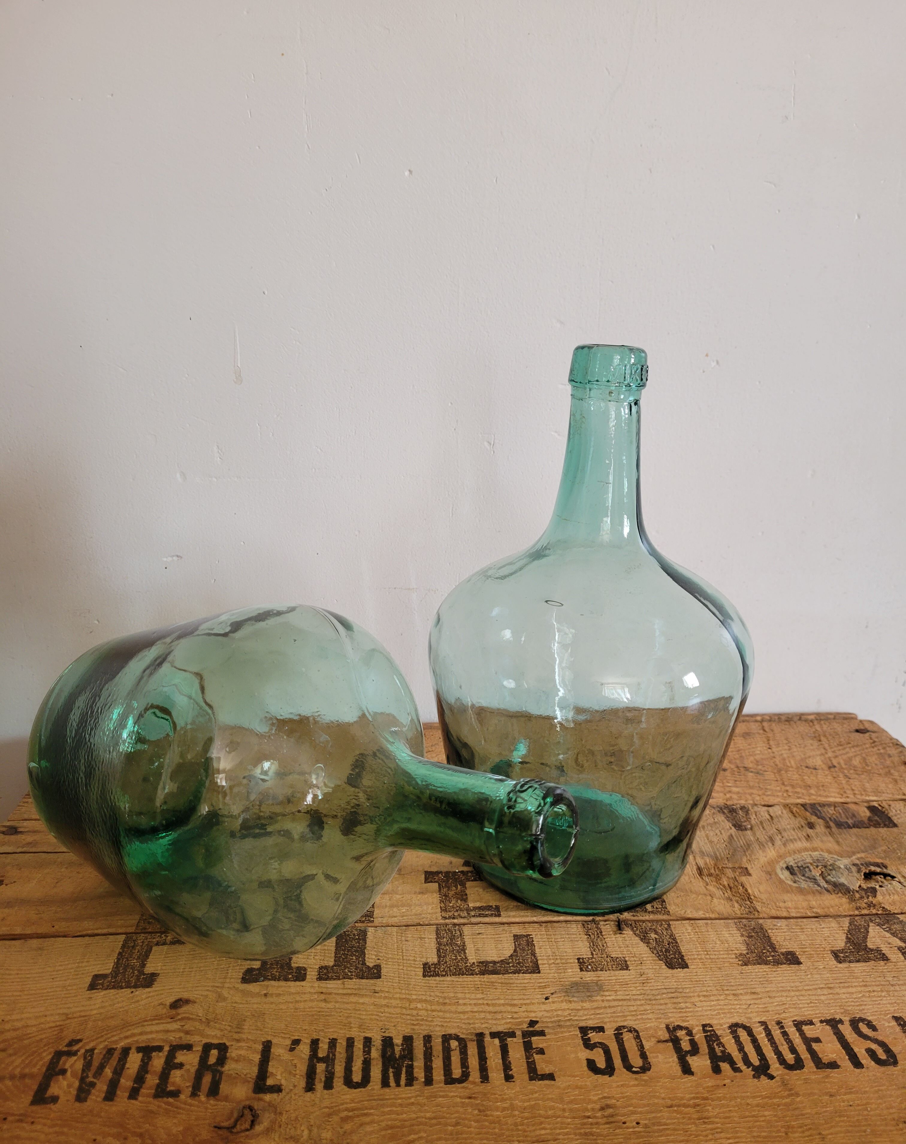 Pair of demijohns