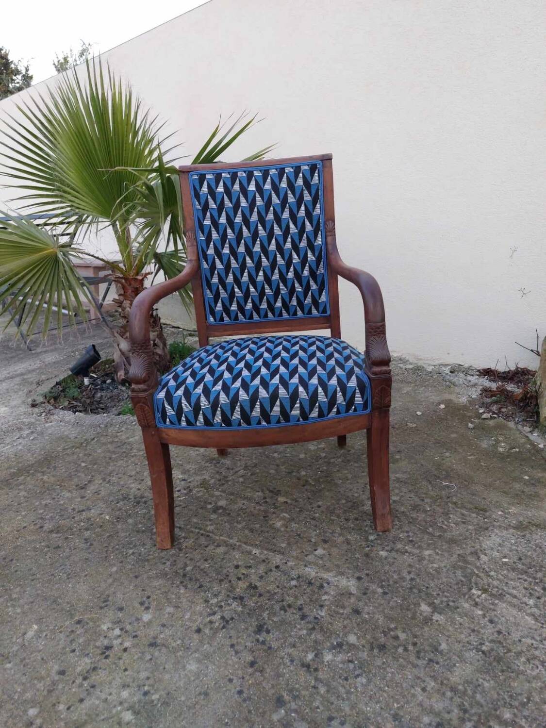 Reupholstered Empire style armchair