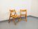 Pair of vintage folding chairs in pine from the 70s and 80s.