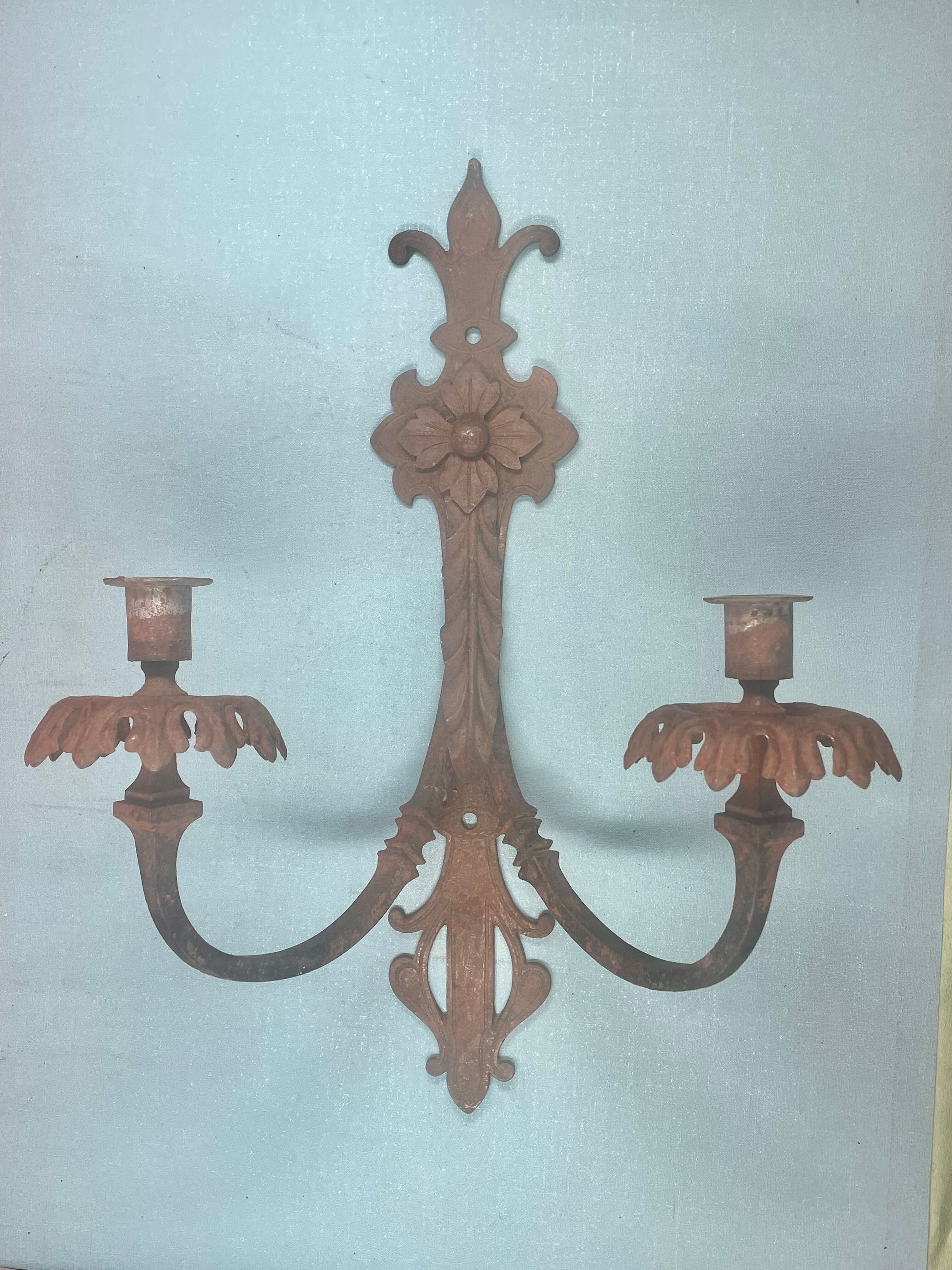 Large pair of non-electrified medieval style candle sconces rusty iron