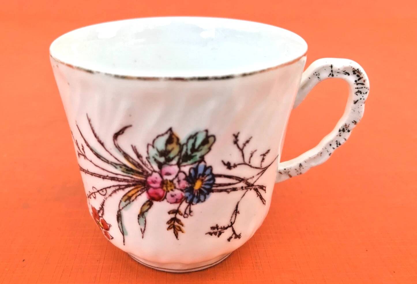 Old coffee cup / saucer in porcelain