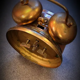 Mechanical alarm clock bell in vintage copper