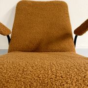 Vintage metal armchair with orange boucle fabric, French design from the 1950s.